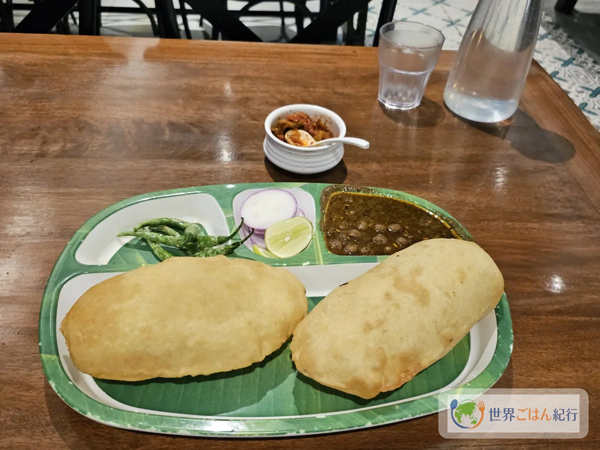 手順6: 豆と茹で汁を加えて煮る（20分）
